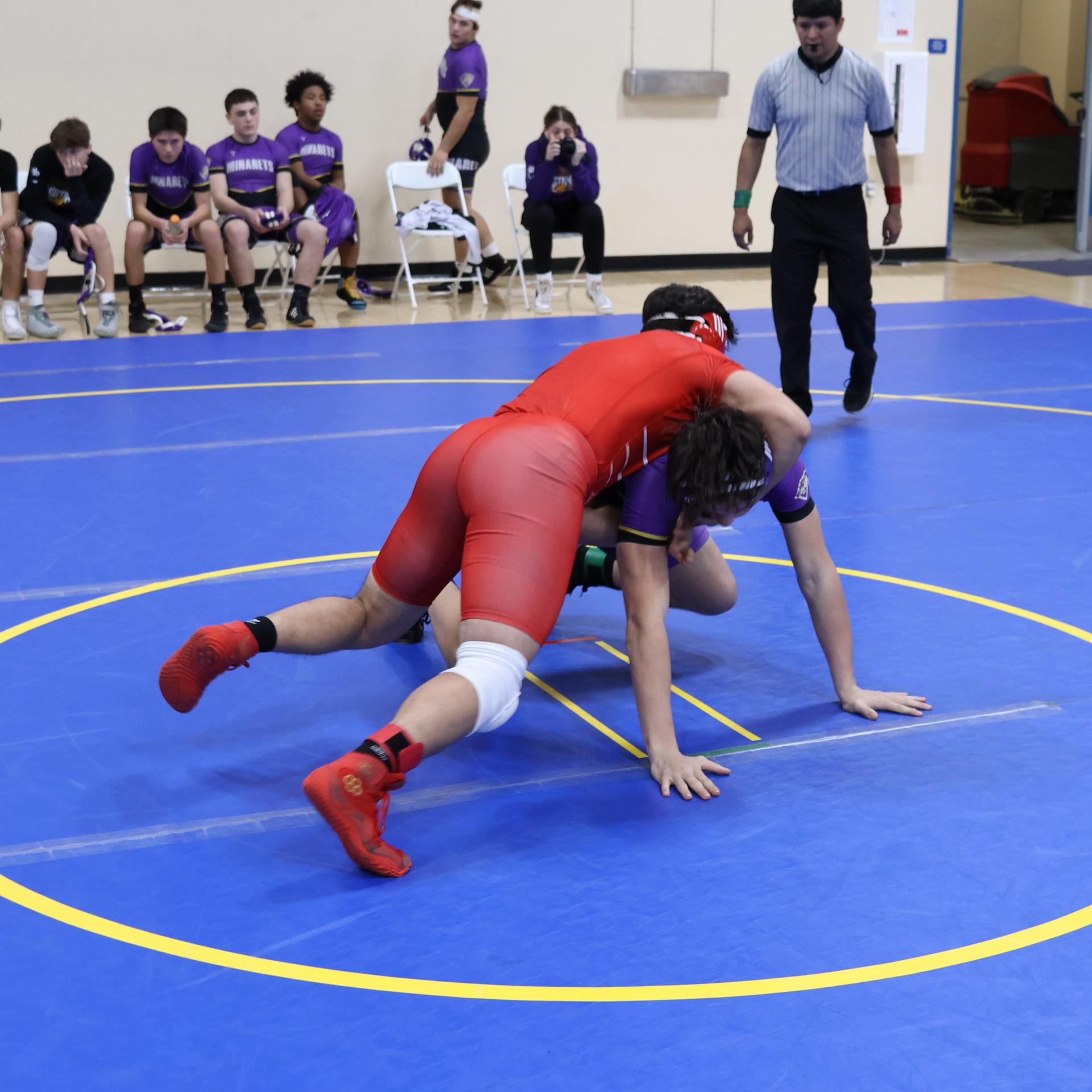 wrestlers in action at parlier