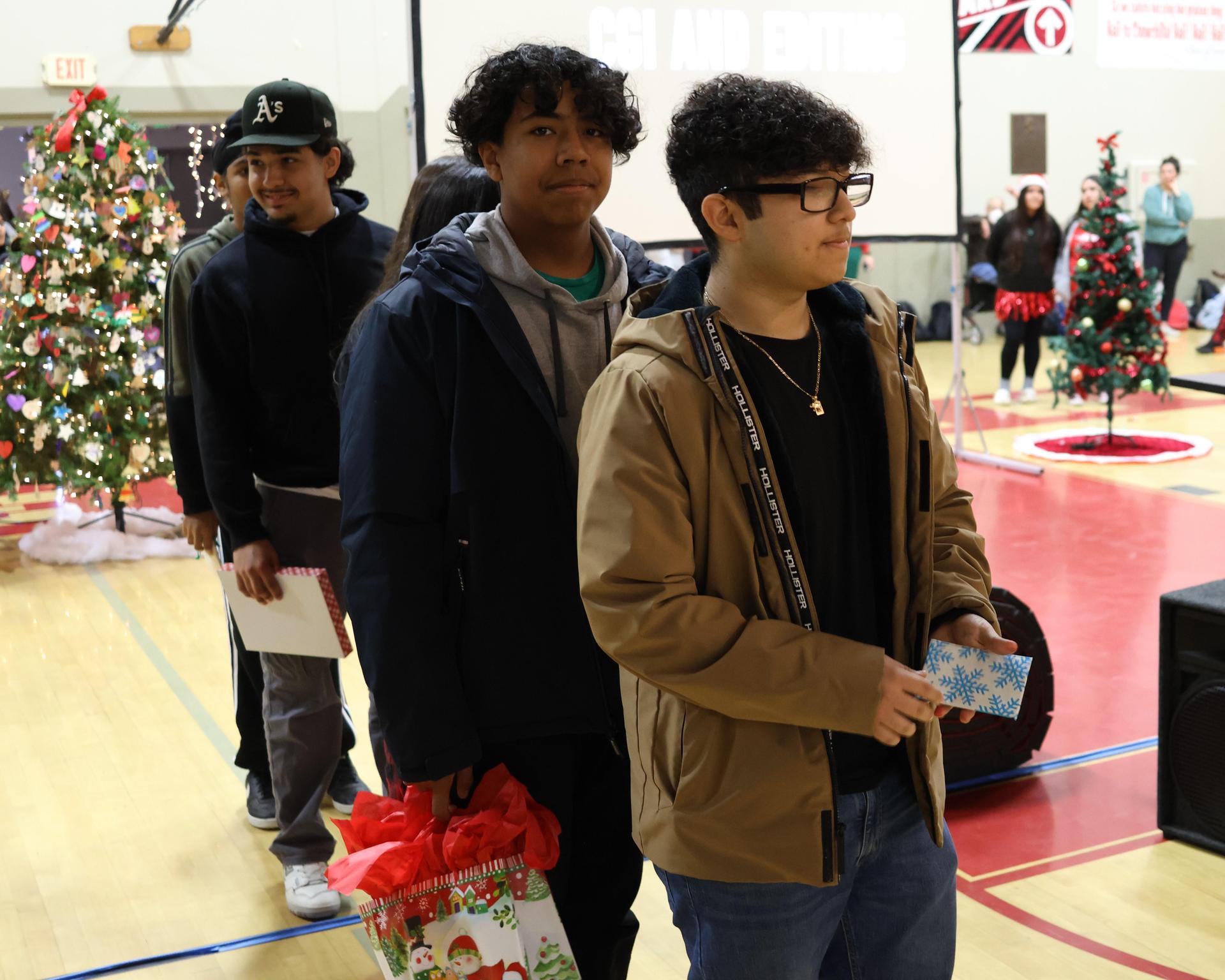 students receiving gifts
