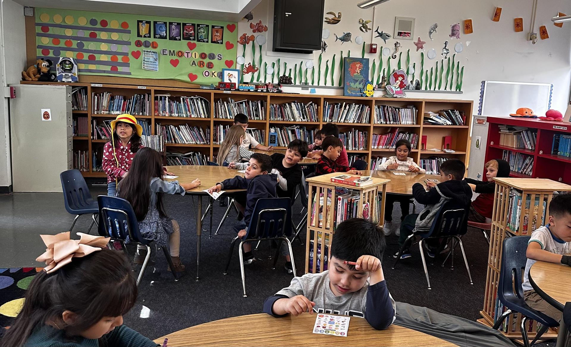 library - Book shelves and students