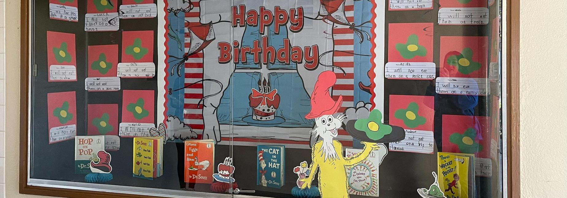 Celebrating Dr. Seuss' birthday with a new bulletin board.