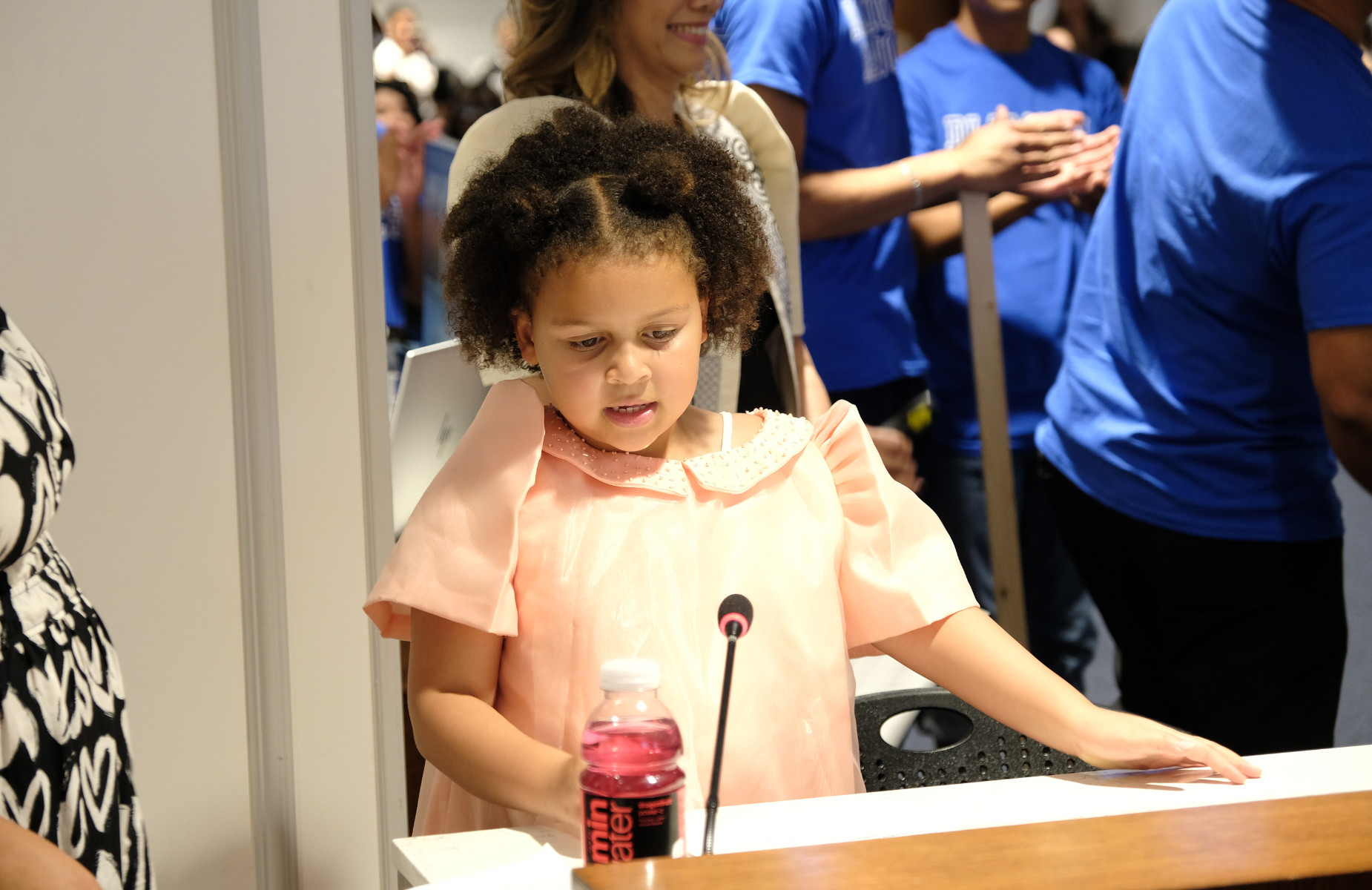 Board meeting on September 9, 2026 - picture of an elementary student who was reading a history summary of Filipino Heritage Month and the importance of the Tikling dance
