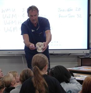 Dr. Eric Hannapel shows students the jaw bones.