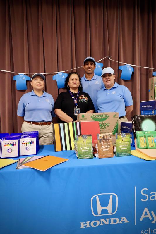 Laura Gonzalez-Garcia and the helpful honda team with school supplies