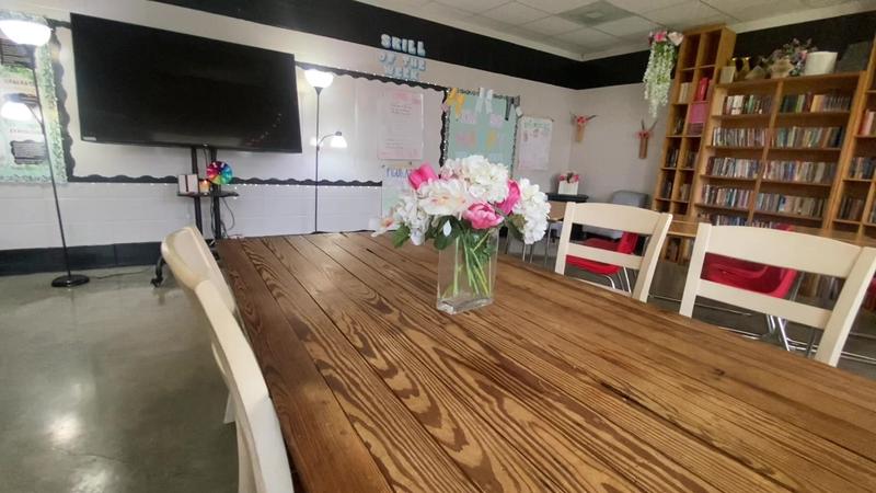 West Lauderdale Middle School Classroom Featuring a Dining Room Table in the Center