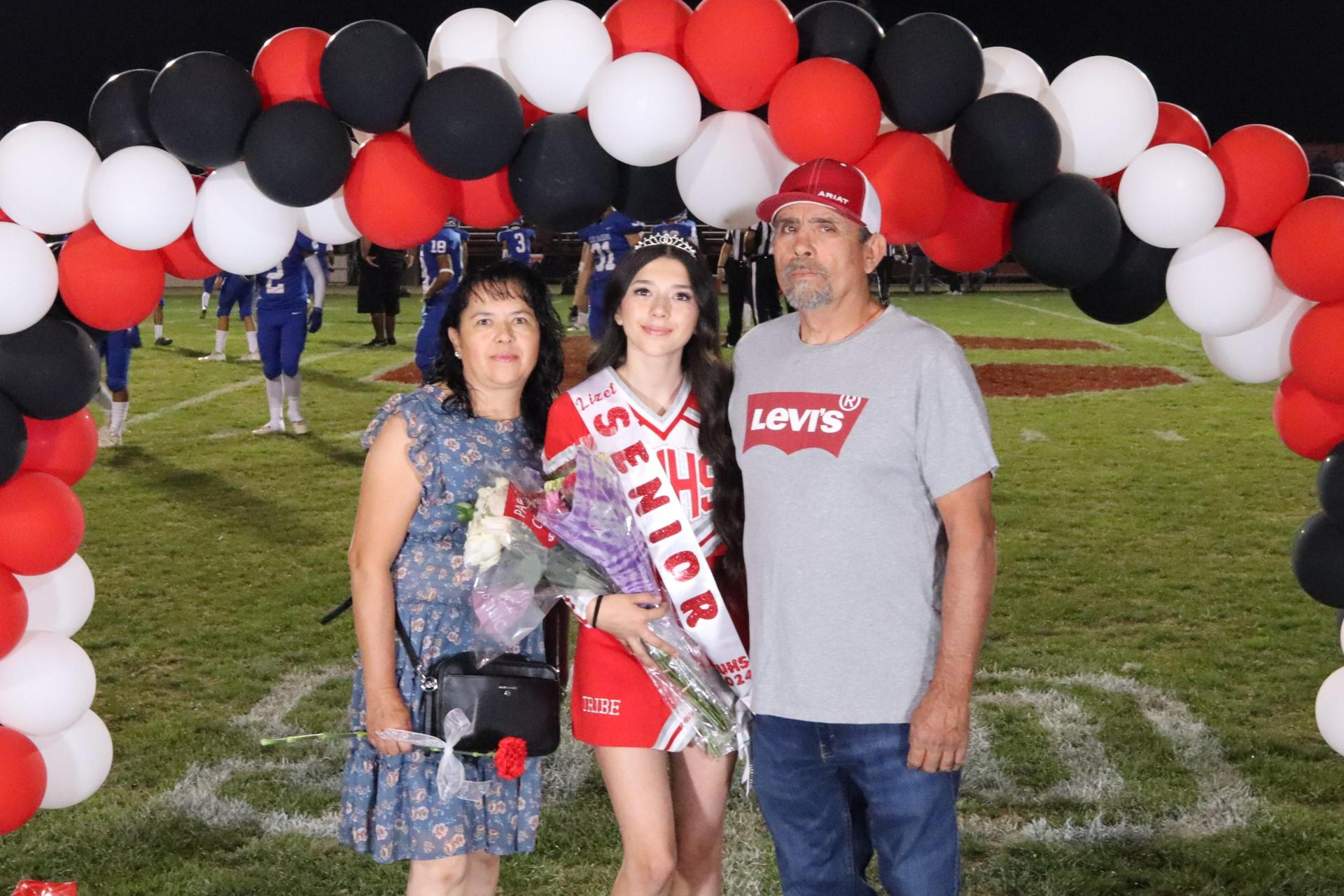 seniors and their escorts celebrating senior night