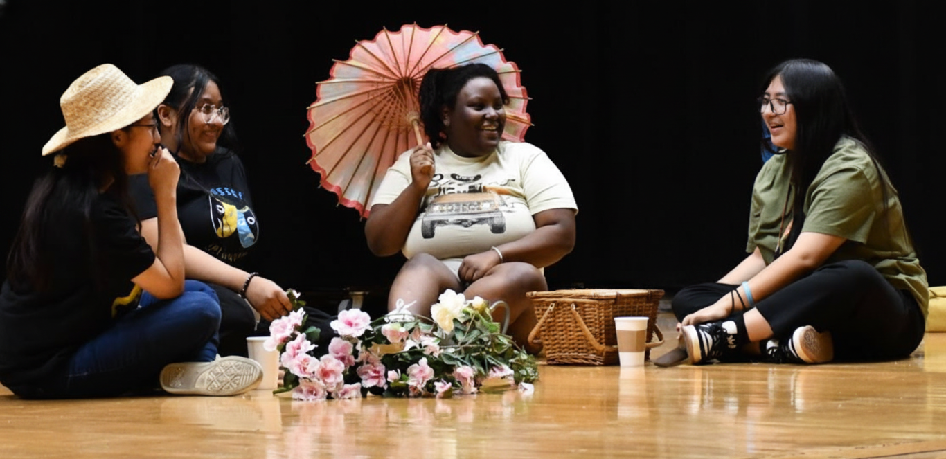 Students from the drama club having a beginning of year meeting.