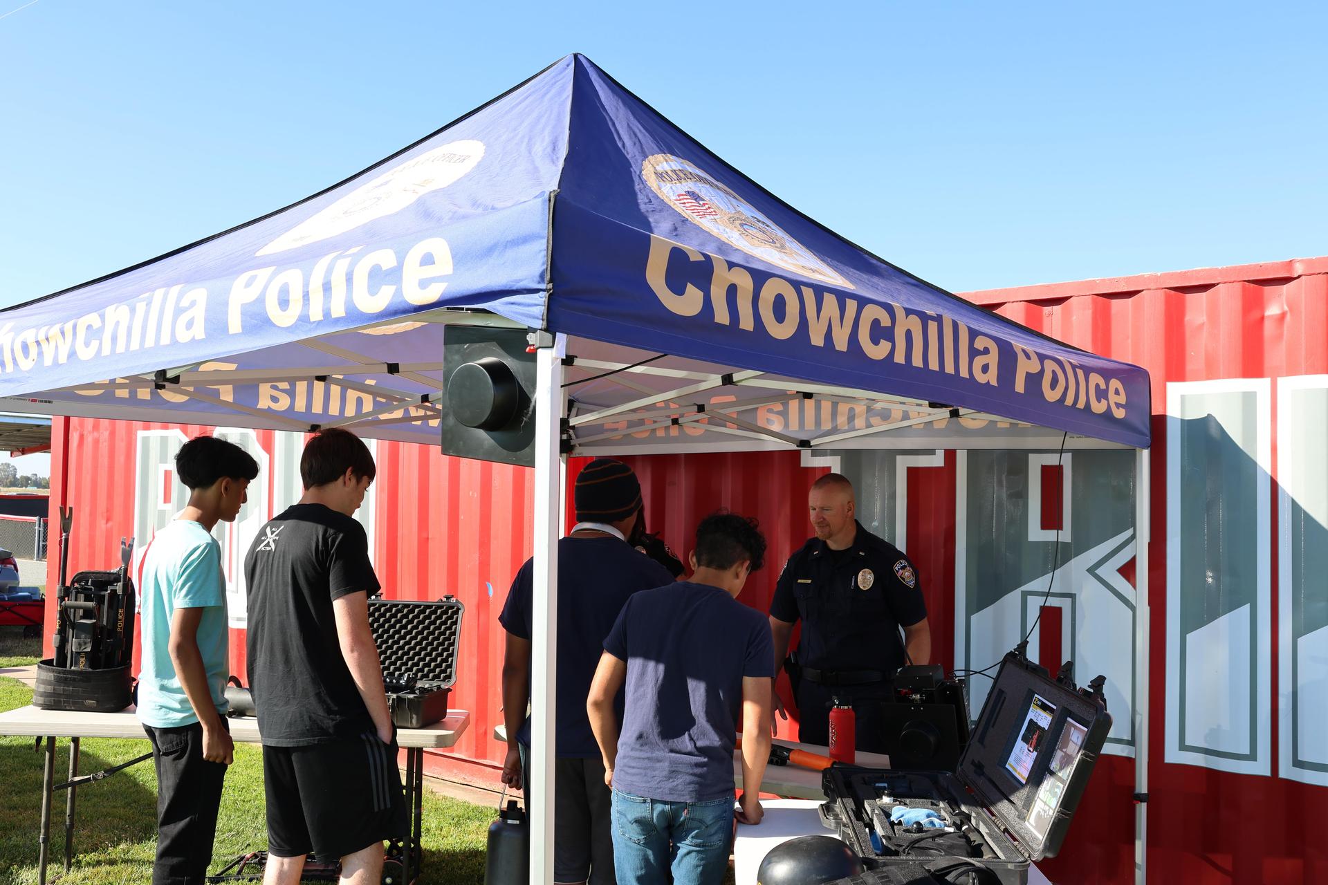 Chowchilla police officers talking to students