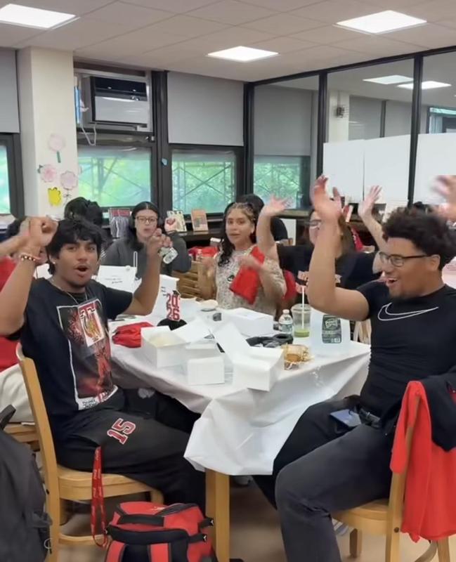 students sitting at a table