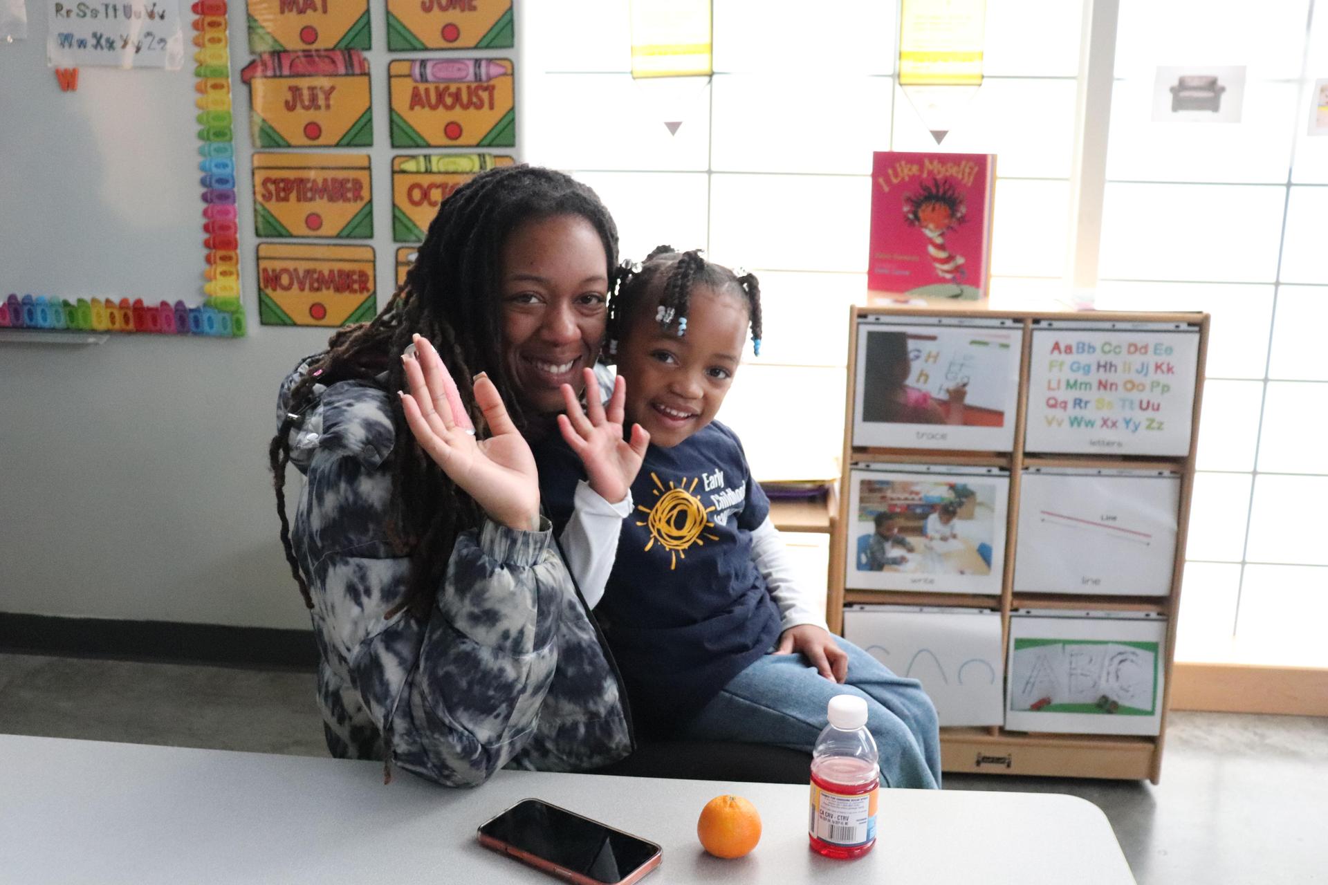 Smiling mother and daughter