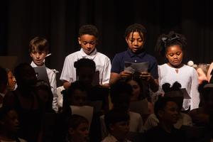 Members of the chorus sing
