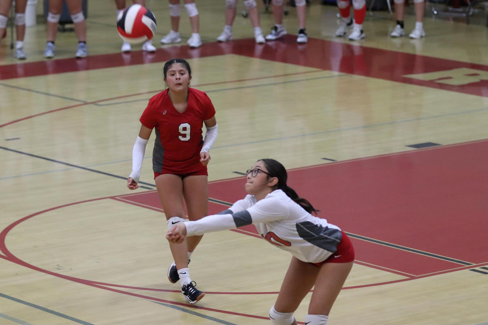 junior varsity girls playing volleyball against Yosemite