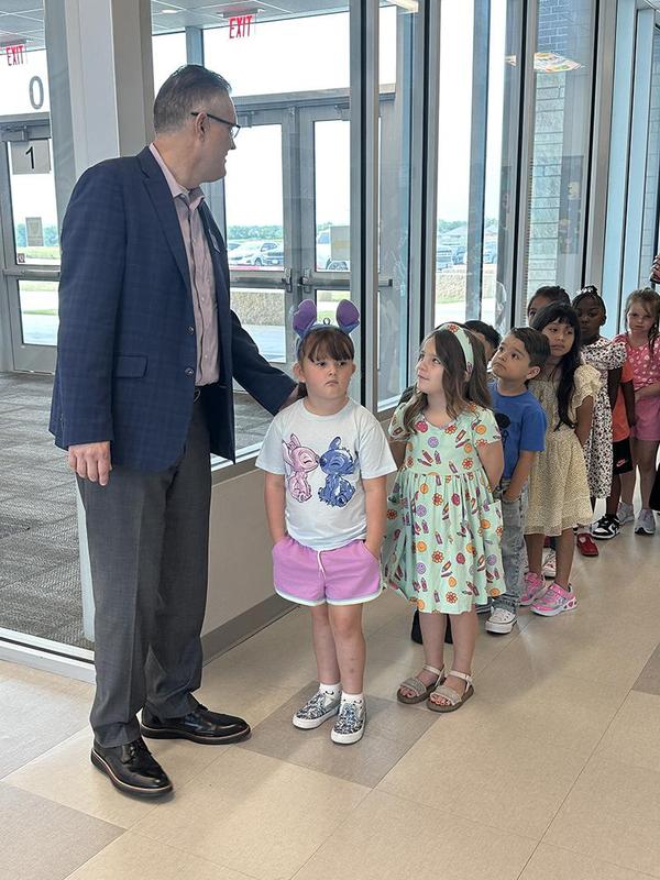 Dr. Ott with Sampson-Howard students on the first day of school