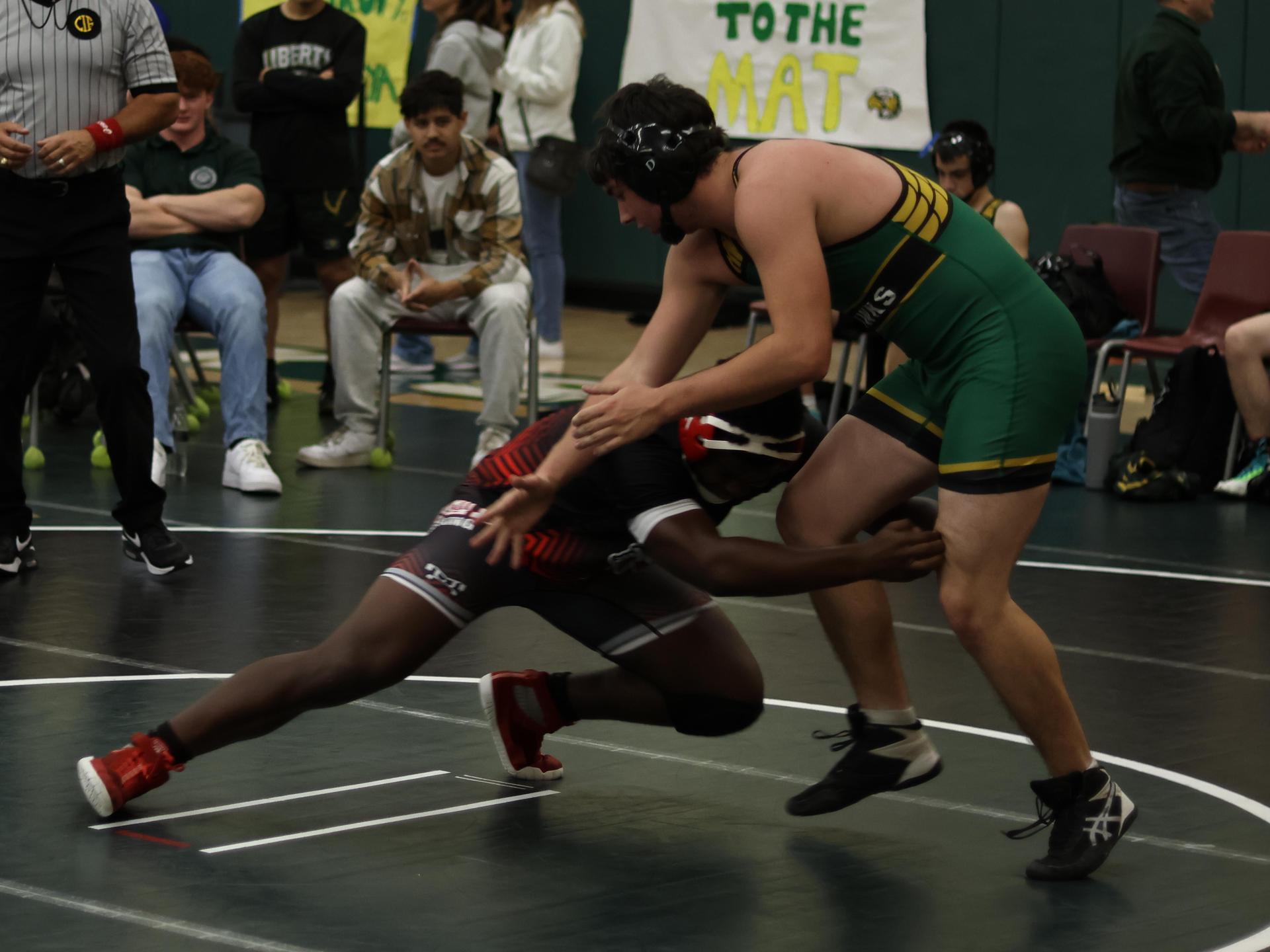boys wrestling at liberty duals