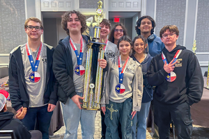 FHS Chess team with their JV State Champion trophy.