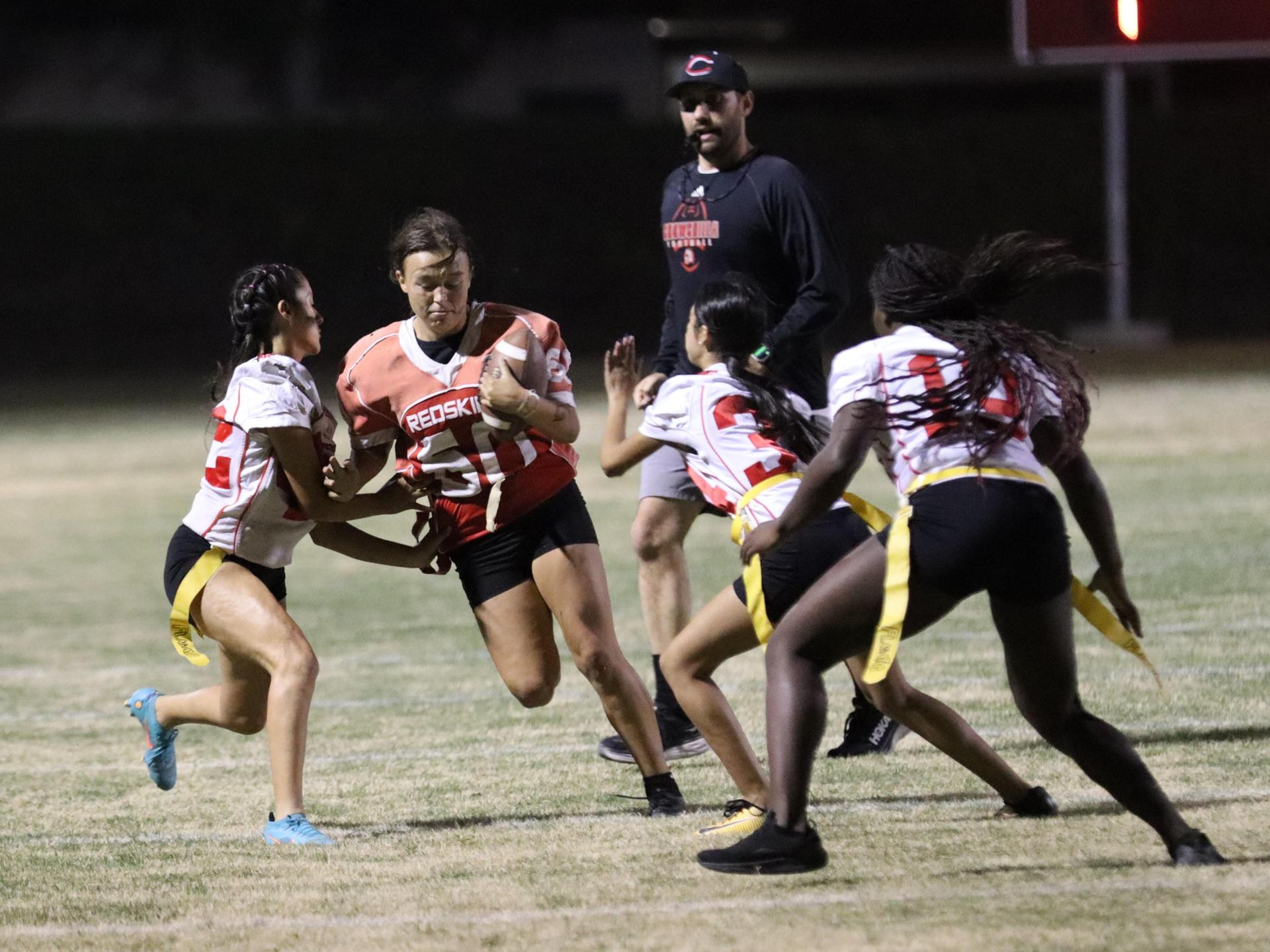 girls playing flag football