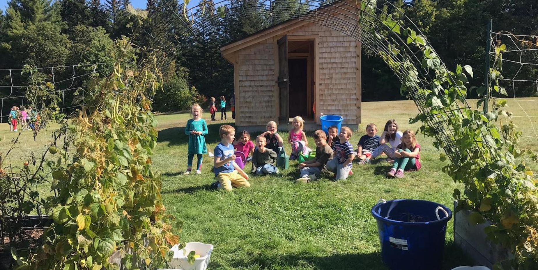 students outside in a garden