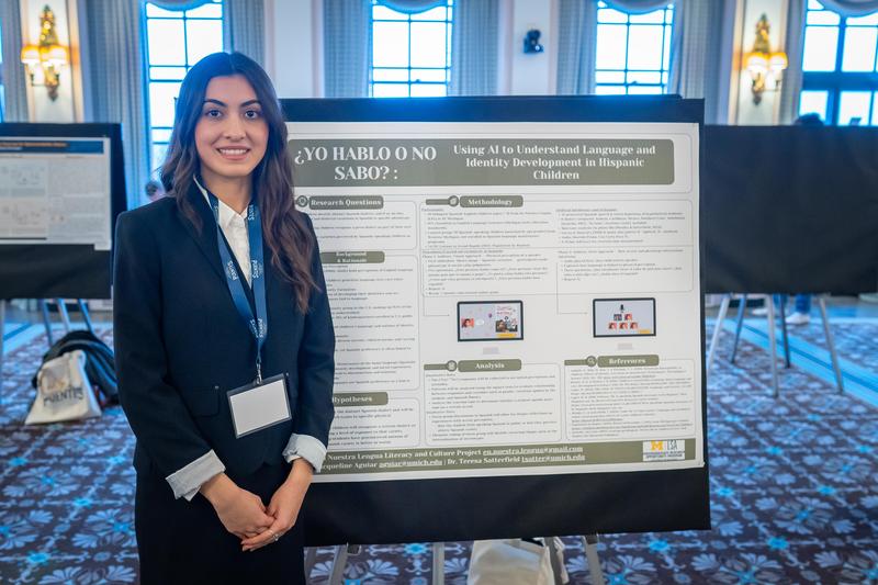 TK Alum Jacqueline Aguiar pictured presenting her research.