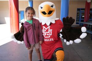 student with MSJC mascot, Ernie the Eagle