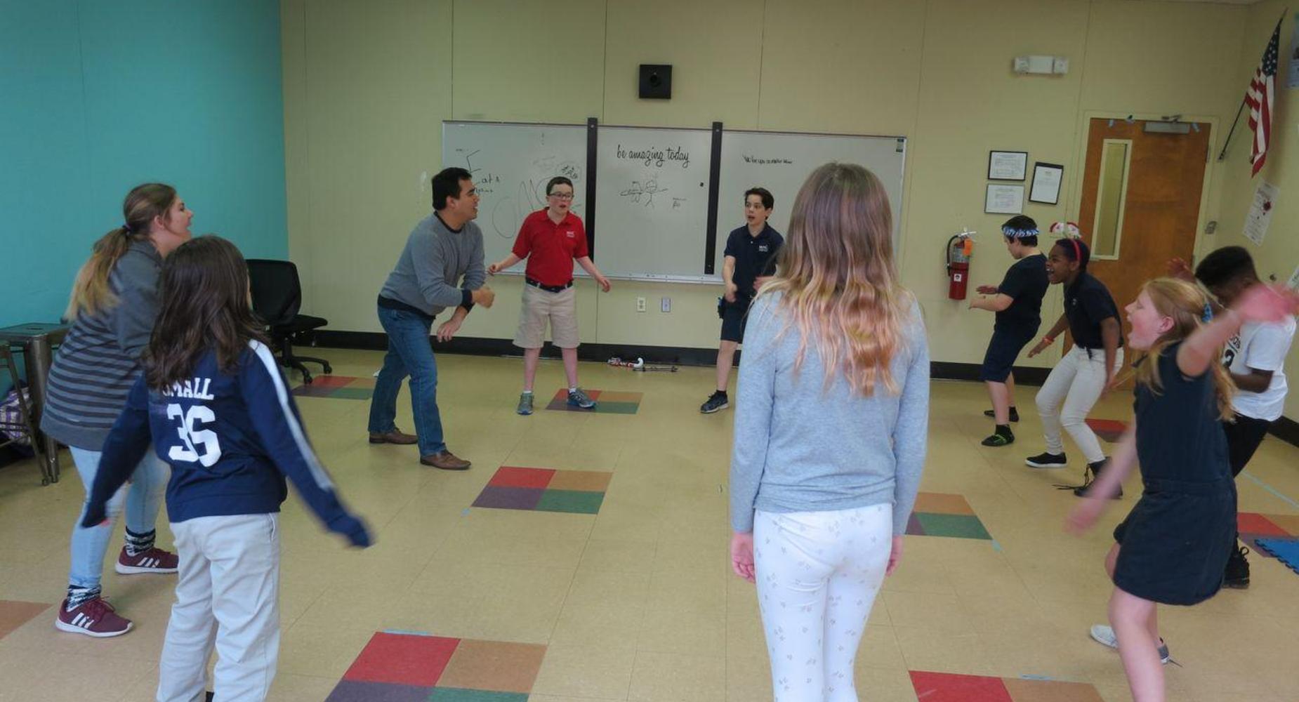Theatre students playing a game