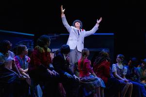 Nicolas Damico as Nicely-Nicely Johnson with the ensemble