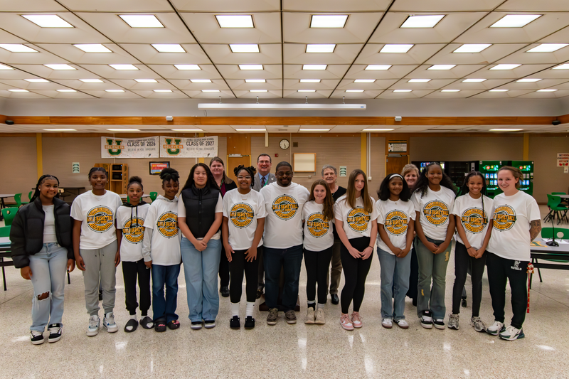 Students stand for a photo at this month's recognition event.