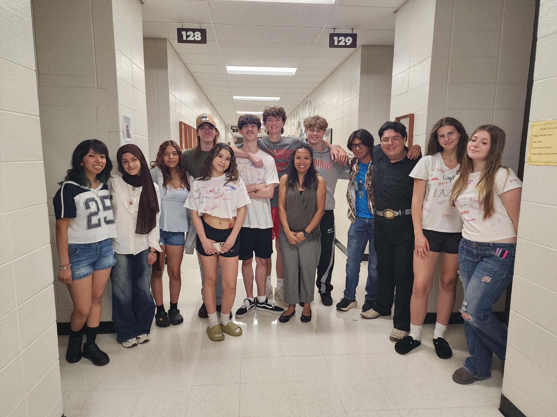 The Class of 2025 crew pose with Ms. Pelini