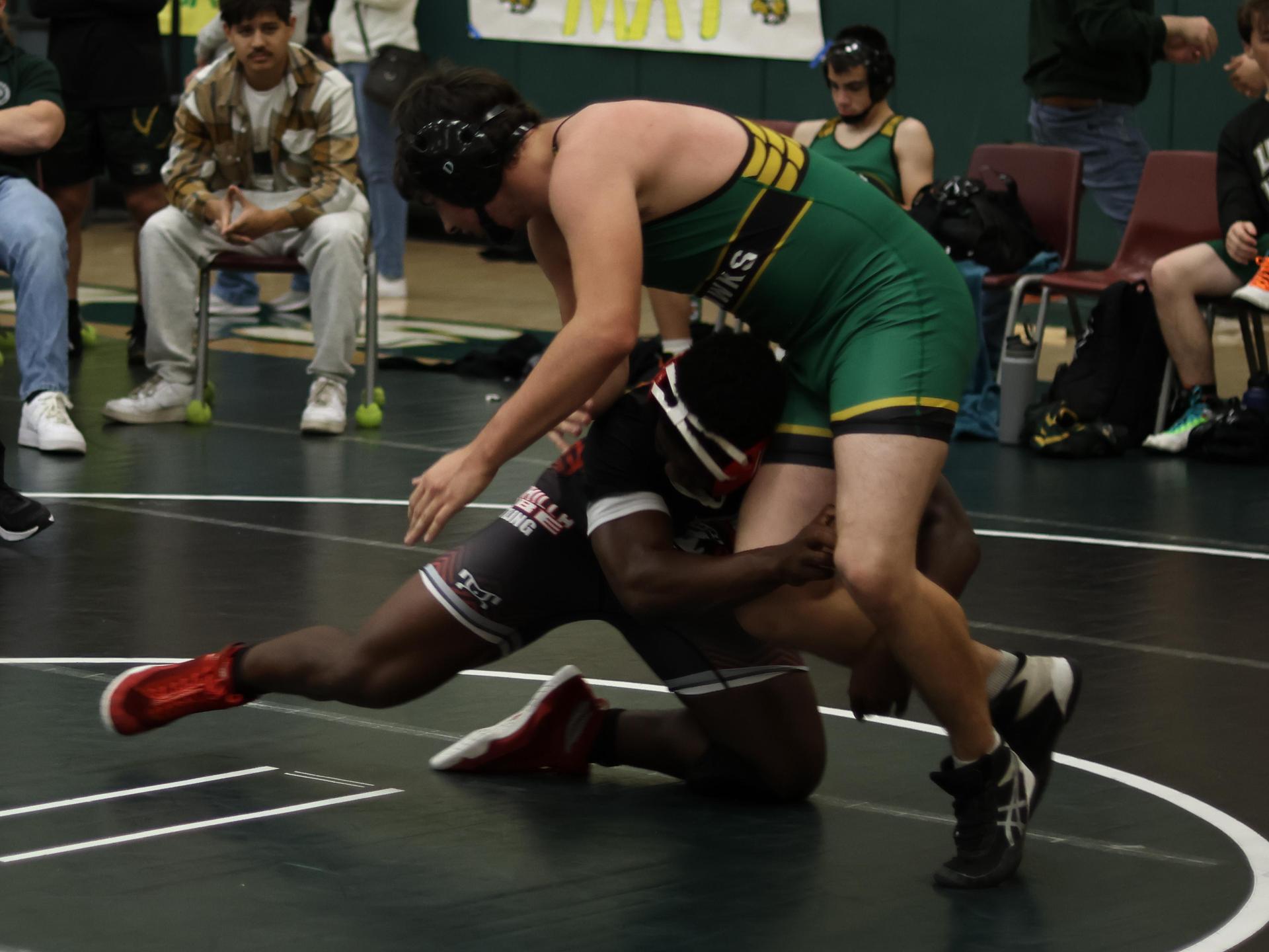 boys wrestling at liberty duals