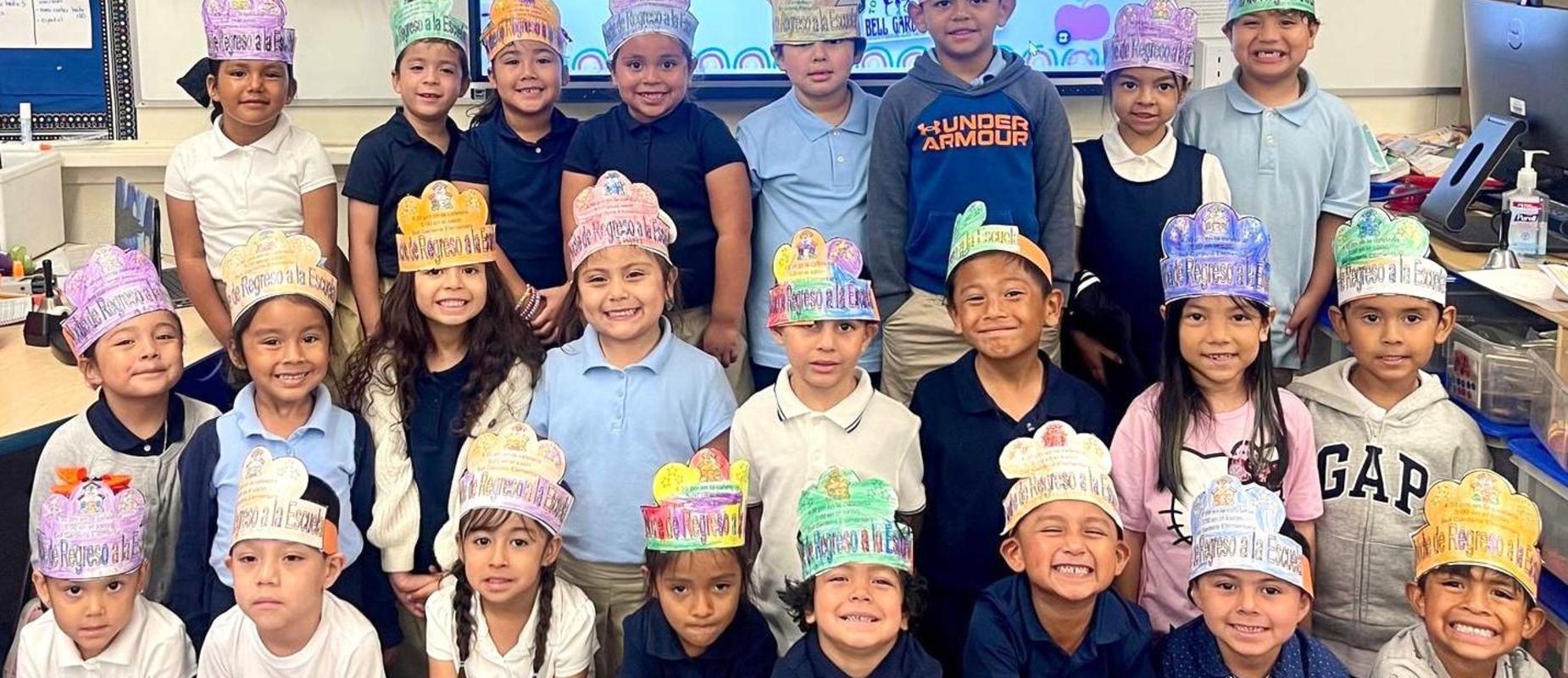Picture of students in their class smiling
