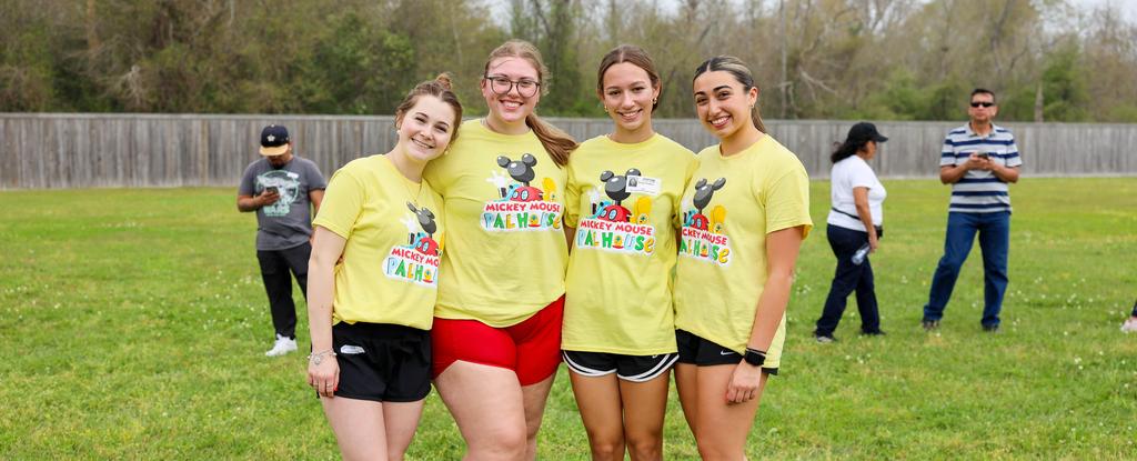 Four teen girls pose during a PALs event.