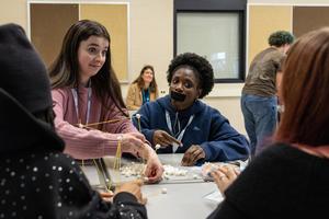 Students make faces during an activity