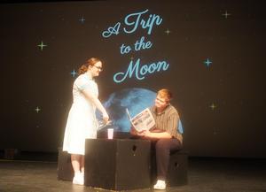 Two students work on lines in a scene for the fall play.
