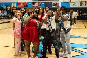 The homecoming court poses for a photo