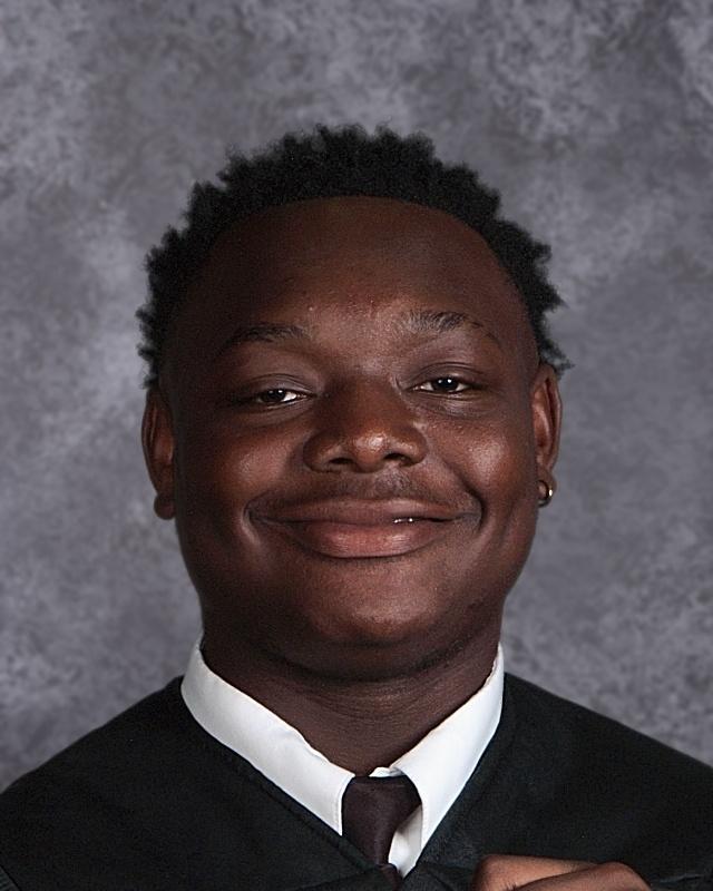 Donta Barnes Head Shot in Graduation Gown