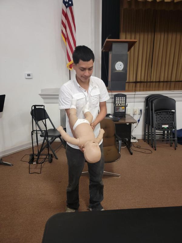 Senior students learning CPR.