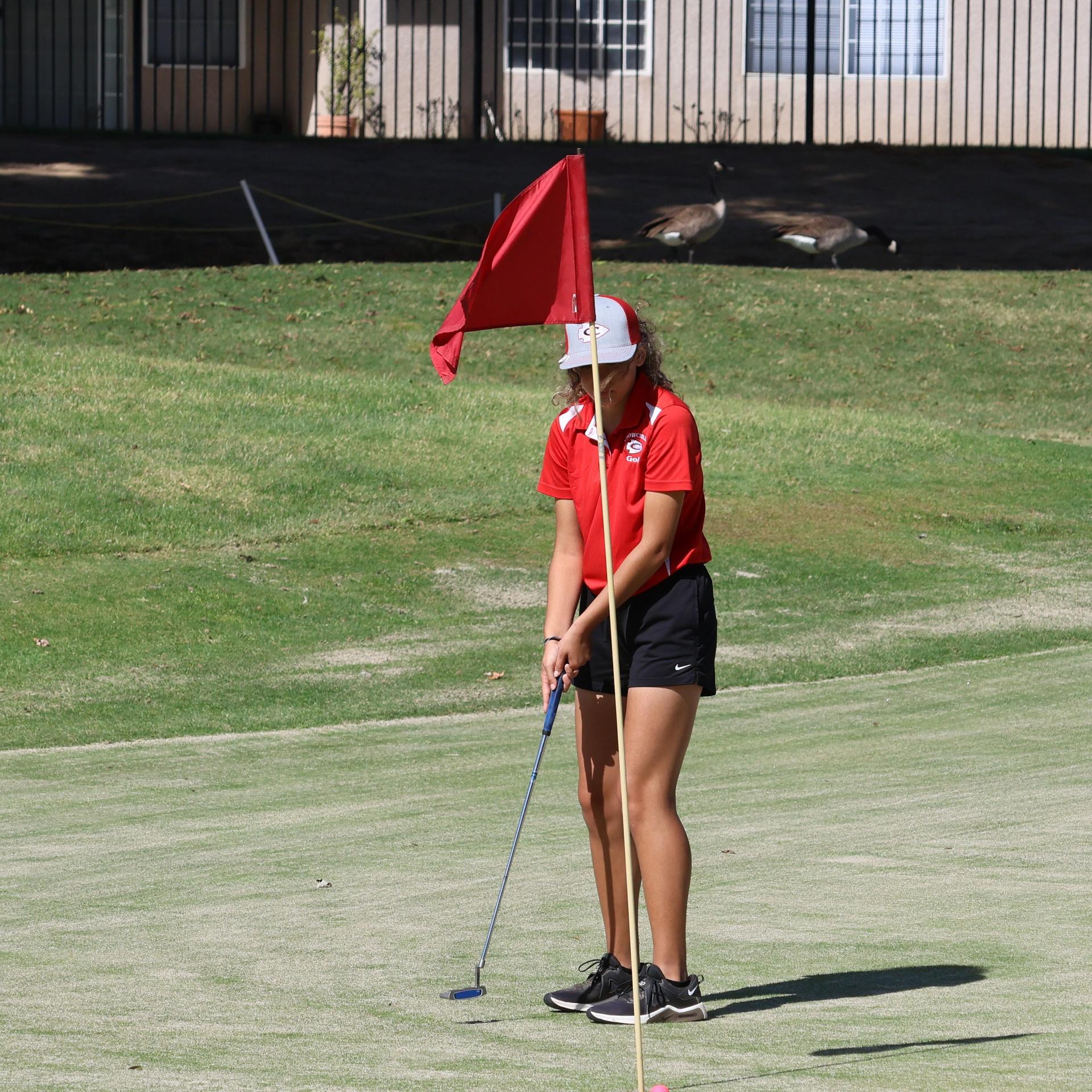 Girls golfers in action at the championships