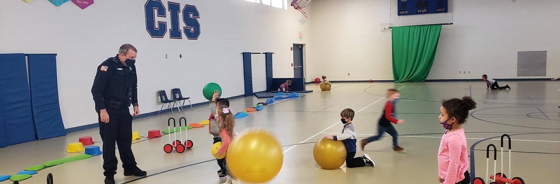 Officer Wills playing with PreK