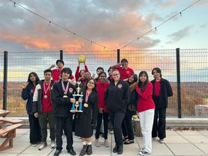 Debate Team group photo on a rooftop.