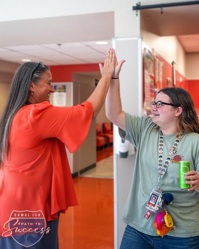 Ms. Duncan and a MECHS studente celebrating the beginning of club season at MECHS.