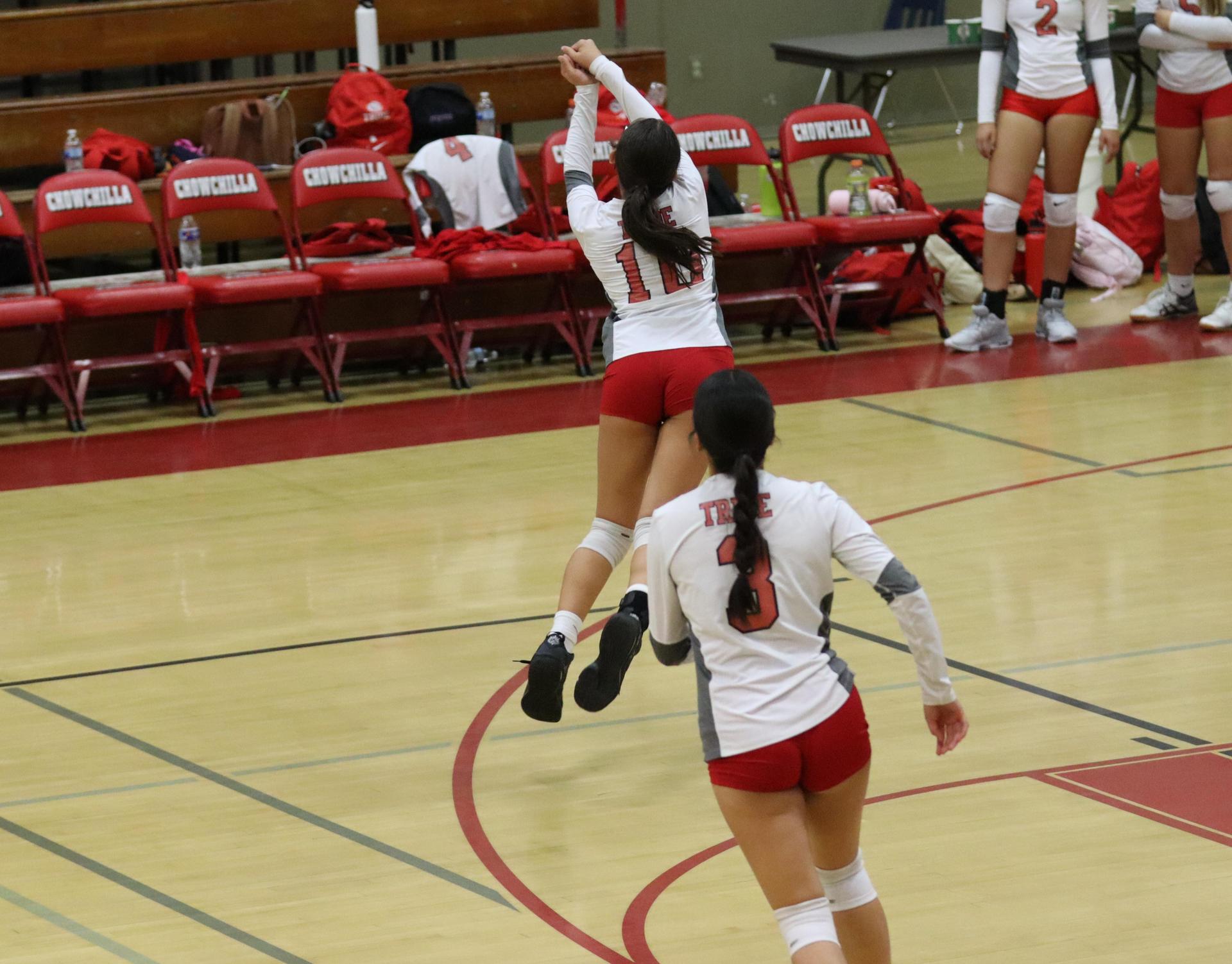 junior varsity girls playing volleyball against Liberty
