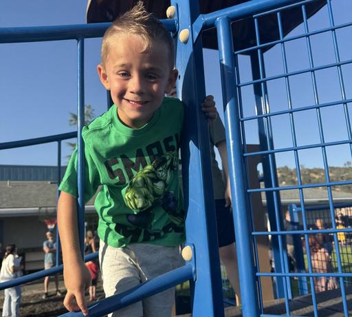 Picture of an elementary student on the playground