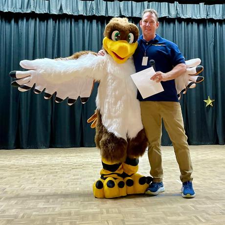 Picture of Rivergold Hawk Mascot with Principal Smoljan