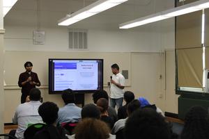 Students presenting Bluebook Co - 2