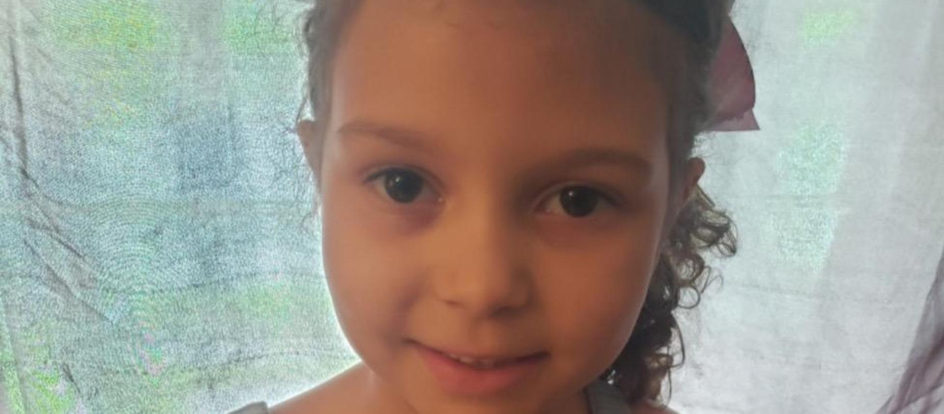 girl smiling for the camera