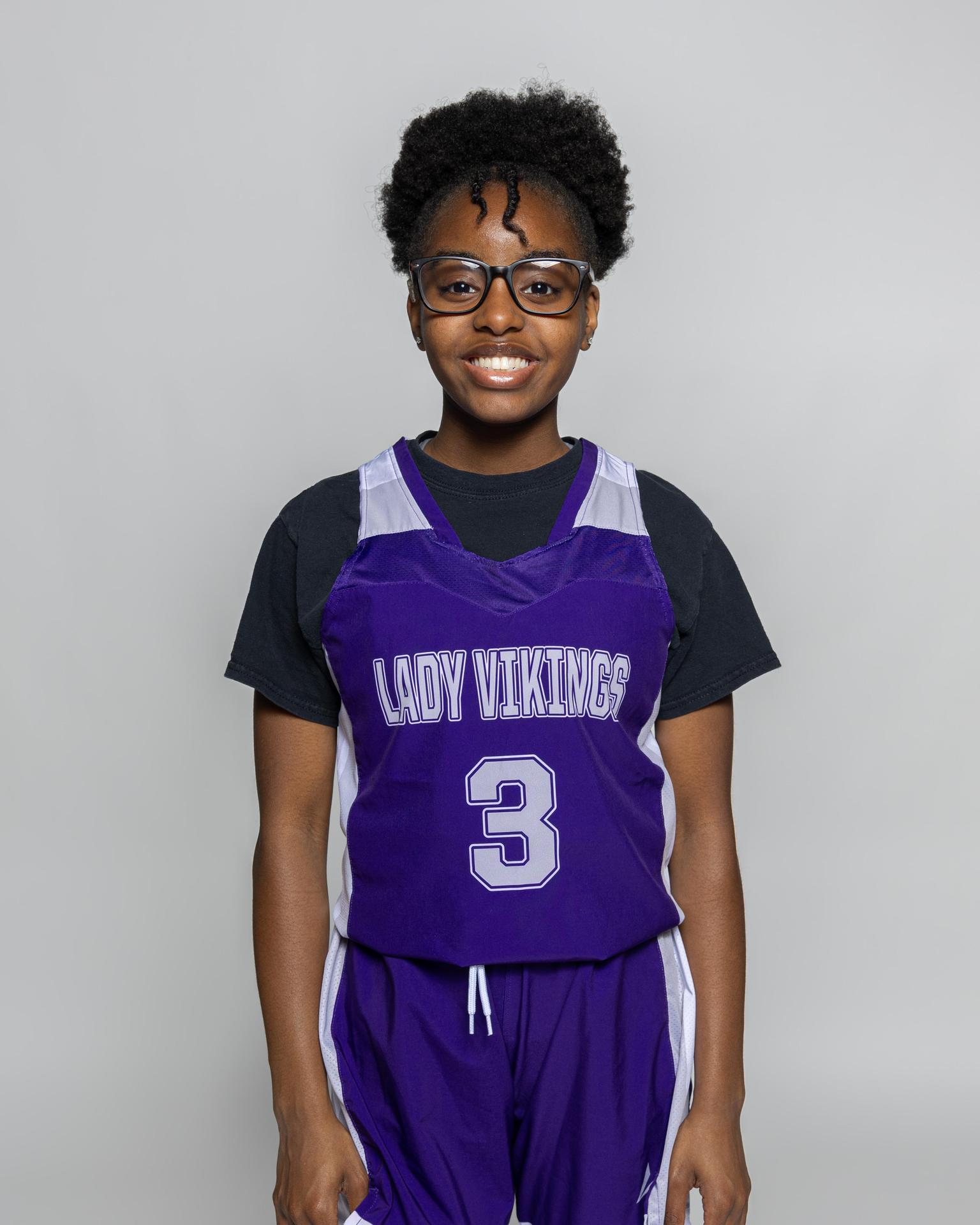 Female player number 3 posting for the roster