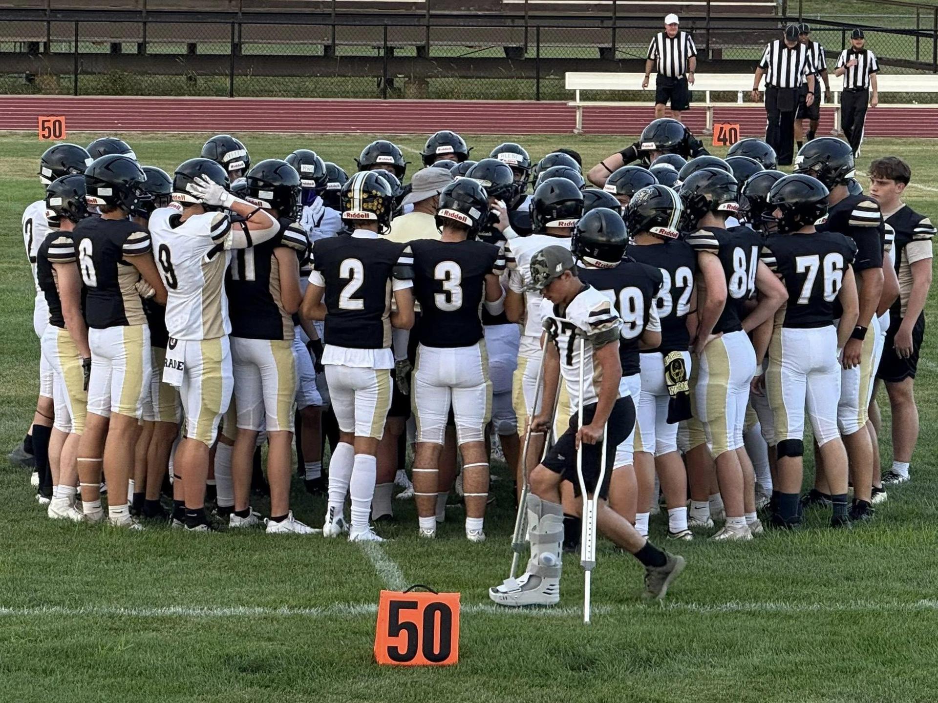 Football Game Huddle 2025