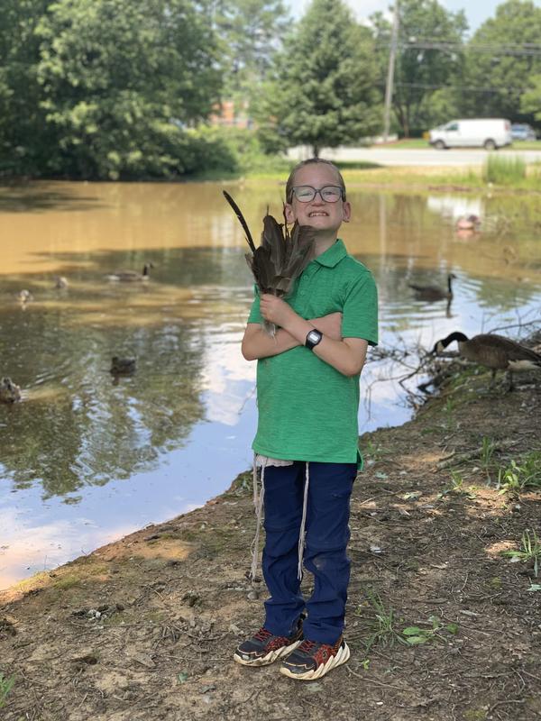 A TDSA student collecting feathers on summer break!