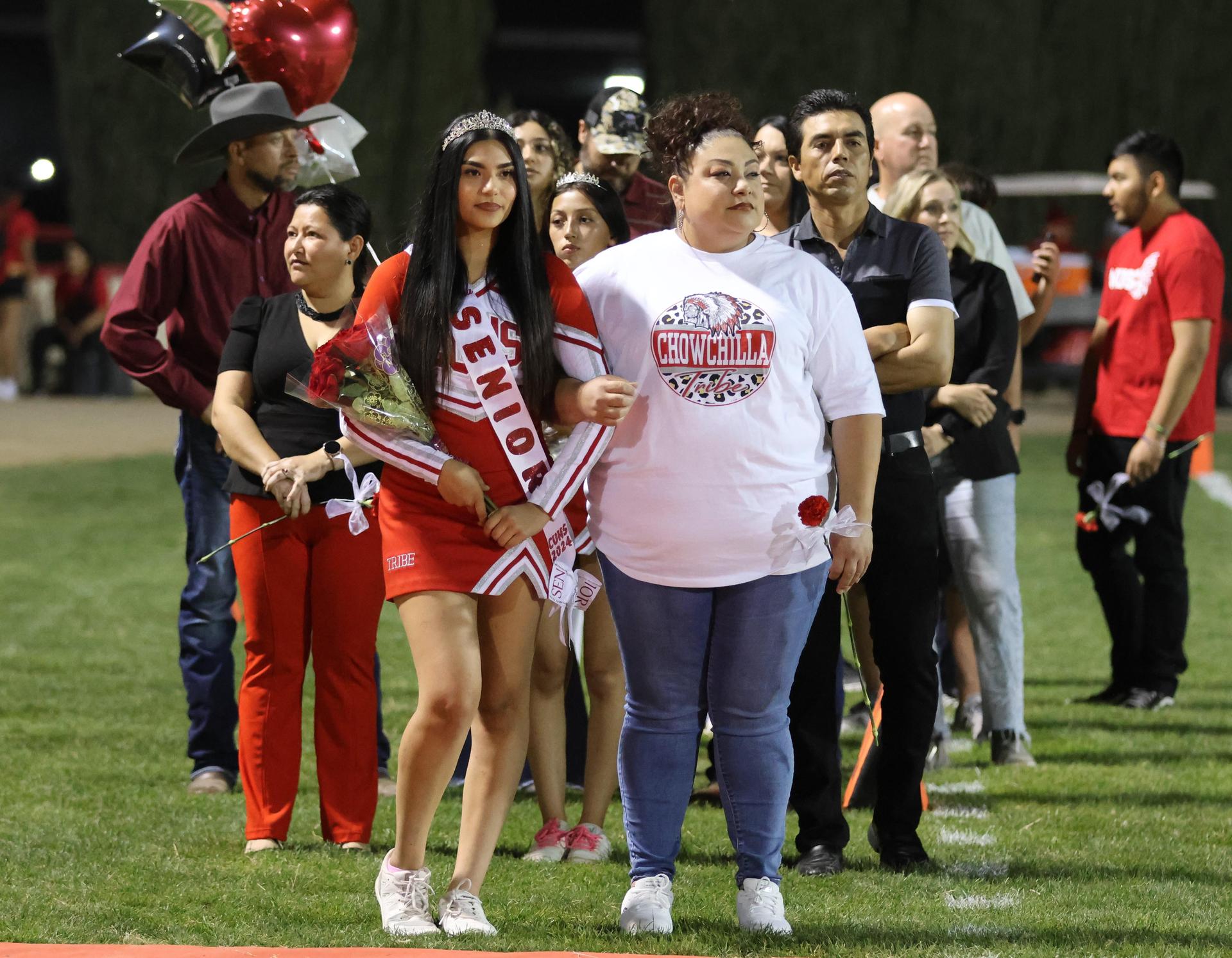 seniors and their escorts celebrating senior night