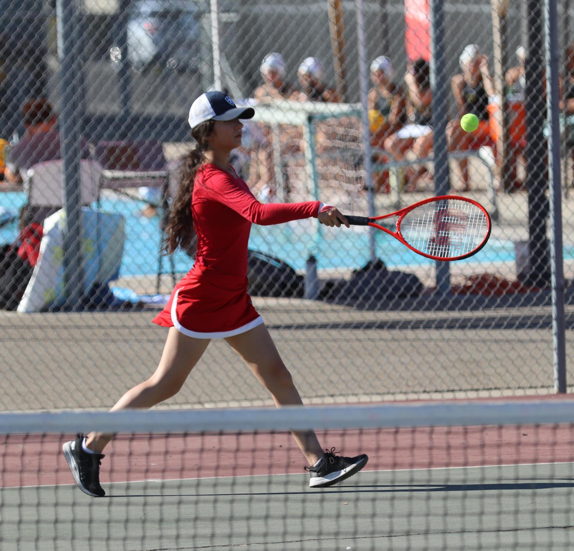 girls playing tennis against Golden Valley