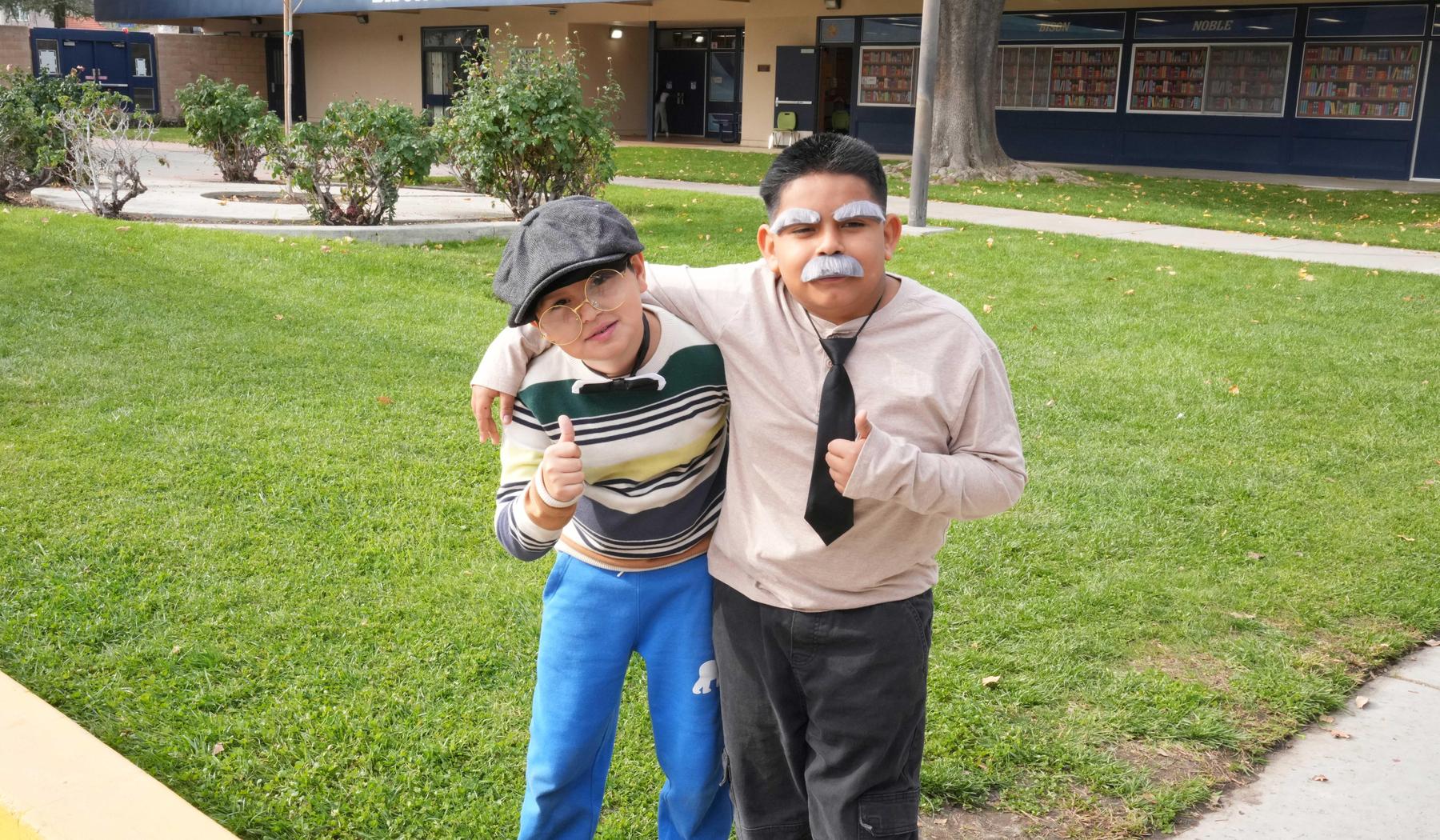 2 boys dressed up as 100 year olds