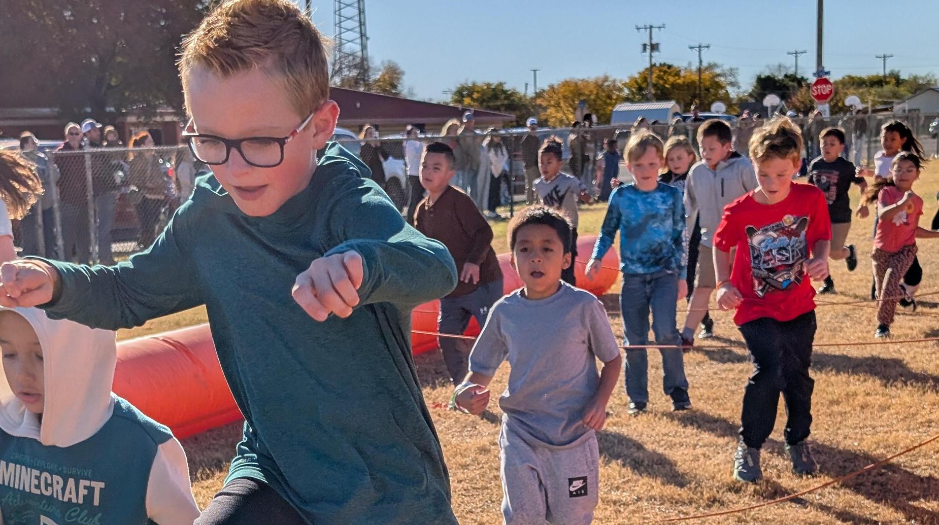 Students running in a race
